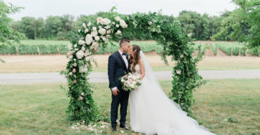 Dreamy Winery Wedding with Lush Floral Arbour