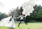 Bride and groom with balloons