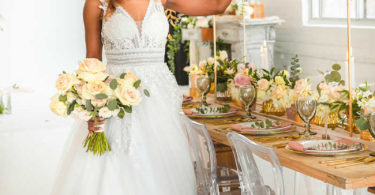 bride with bouquet boho theme