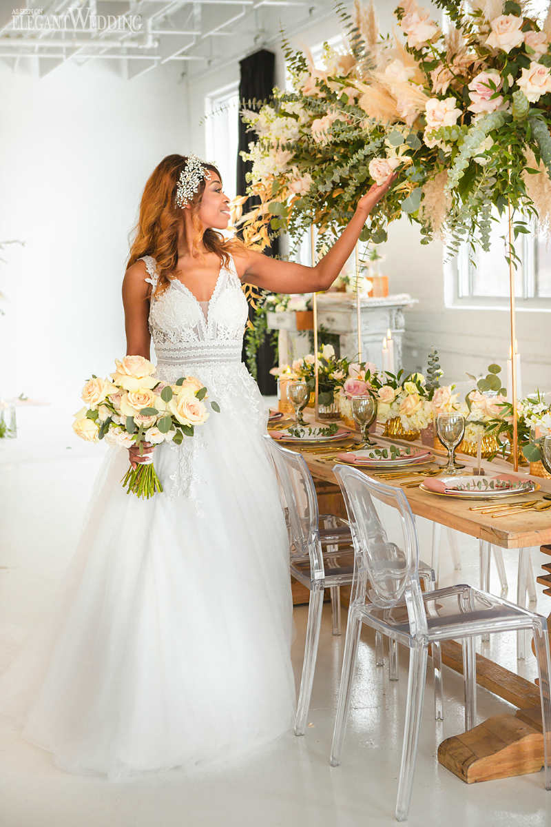 bride with bouquet boho theme