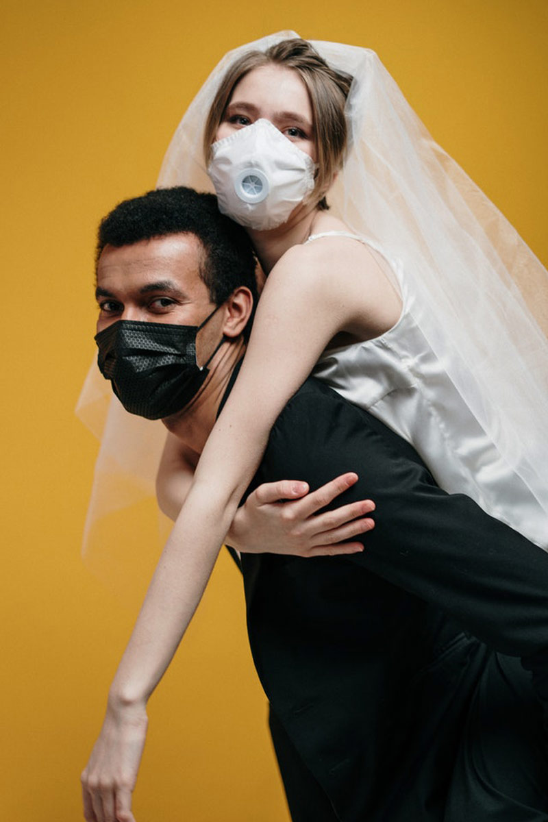 WEDDING COUPLE WEARING MASKS