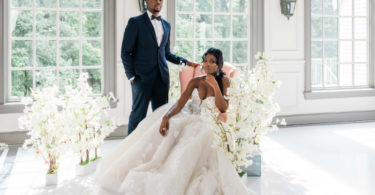 bride and groom with black tuxedo