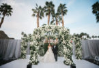 green and white floral arch