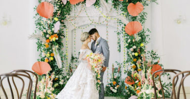 ceremony arch with citrus inspiration