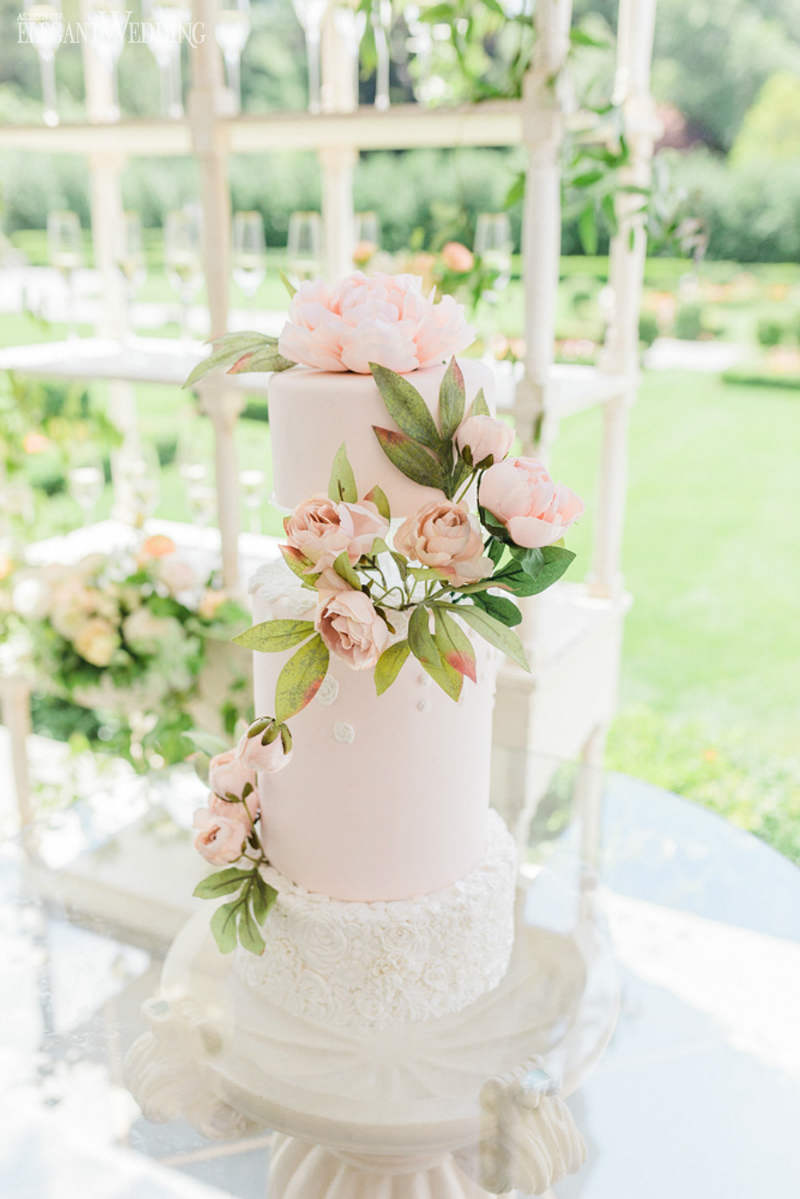 pink wedding cake with flowers