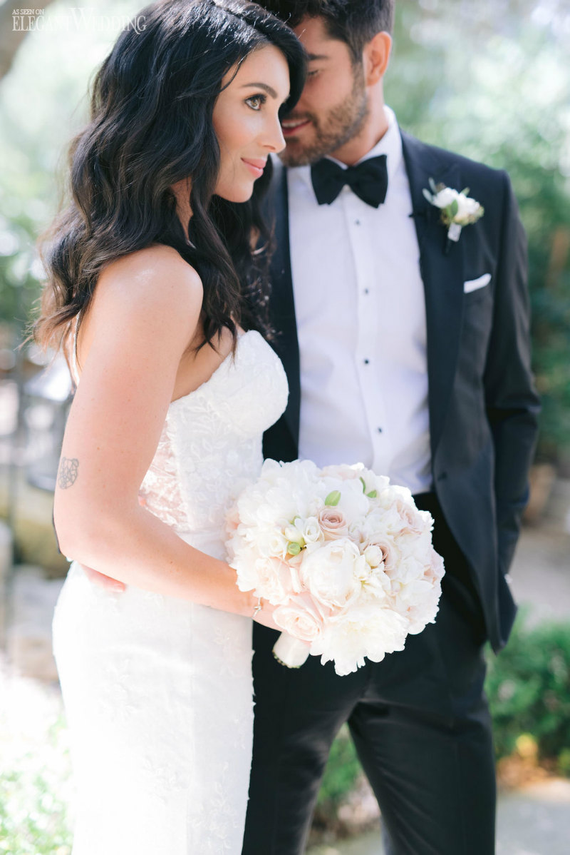 beautiful bride with a white bridal bouquet