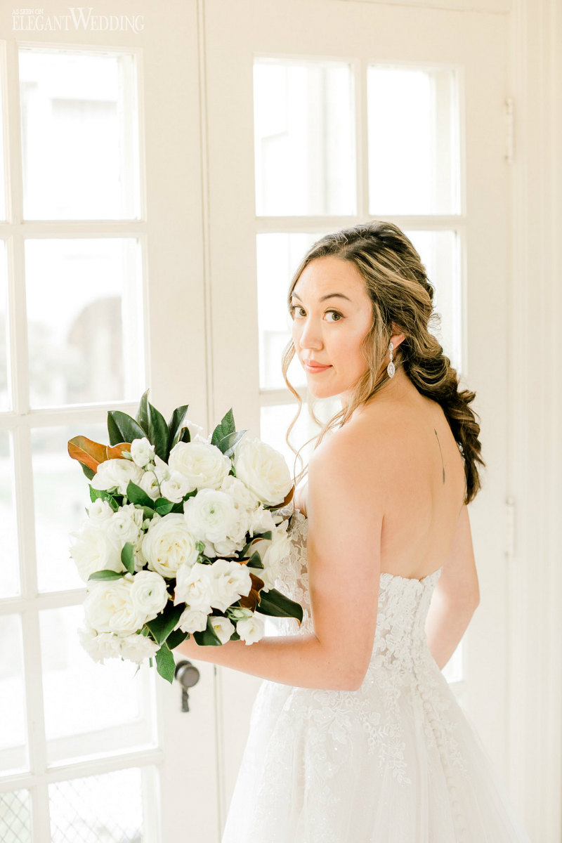 bride with a white bridal bouquet