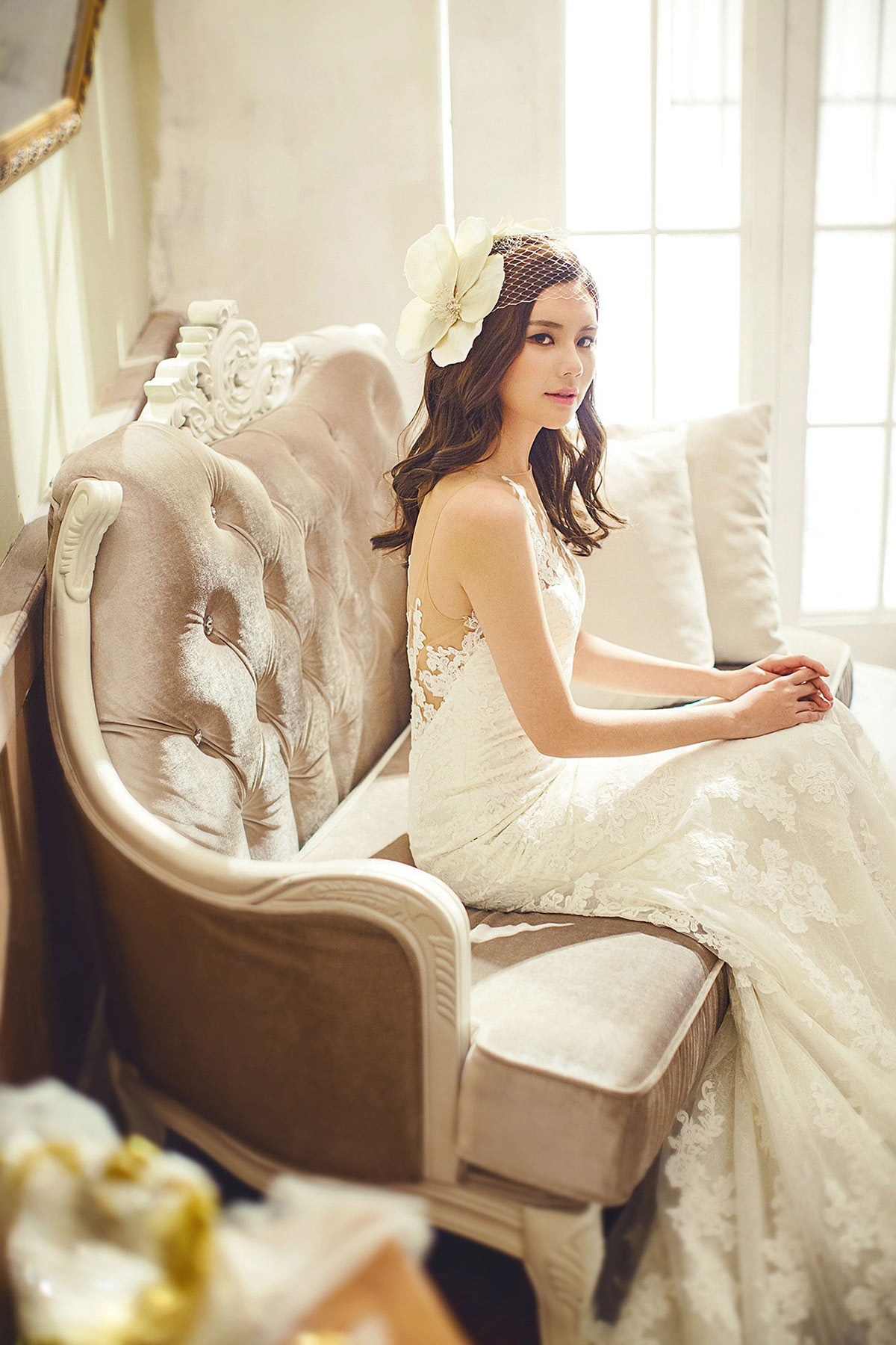 bride sitting on a sofa