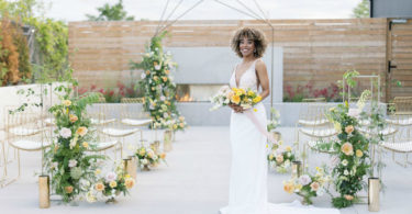 bride with a pretty yellow and white wedding ceremony