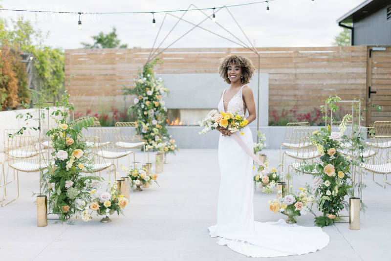 bride with a pretty yellow and white wedding ceremony