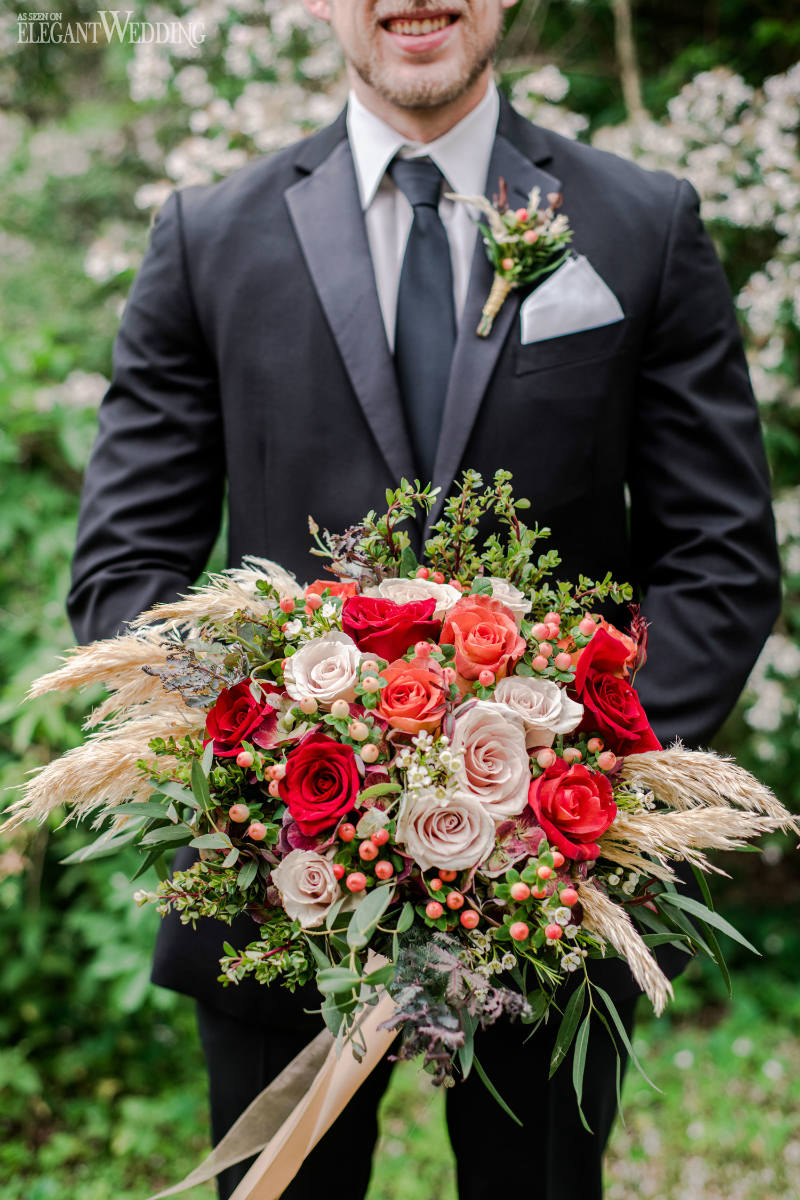 groom with wedding bouquet