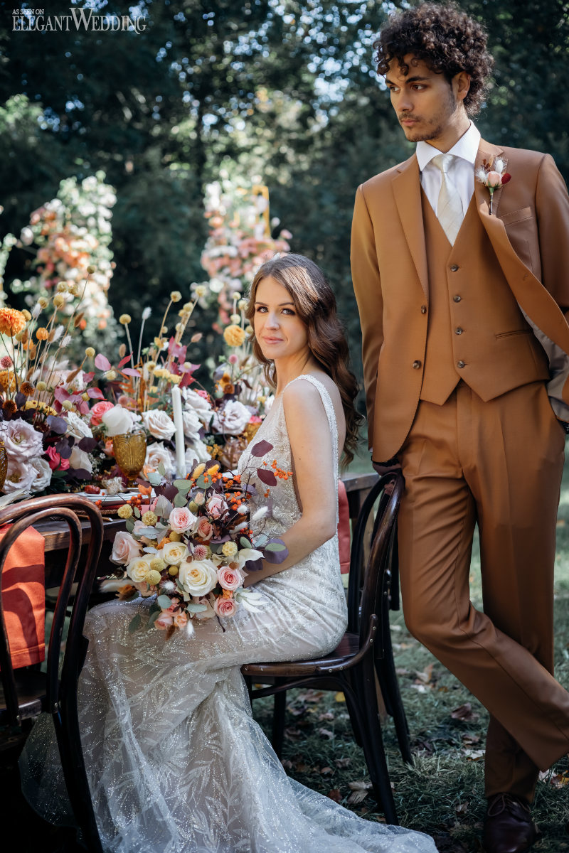 bride in a fall wedding decor set up