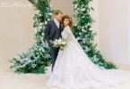 a regal wedding theme with a gorgeous floral arch