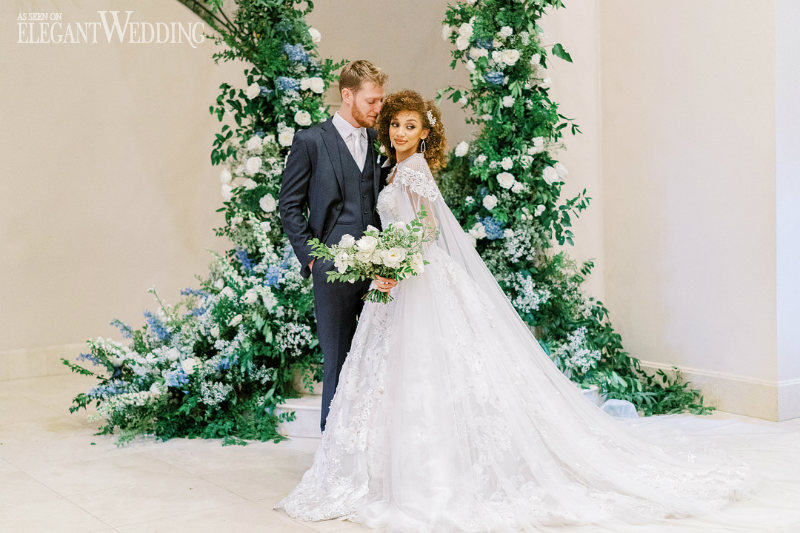 a regal wedding theme with a gorgeous floral arch