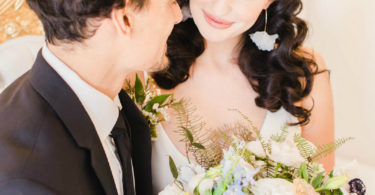 bride and groom with a bridal bouquet