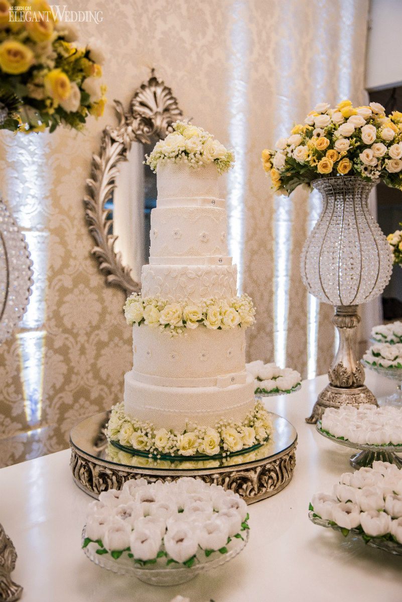 white wedding cake with flowers