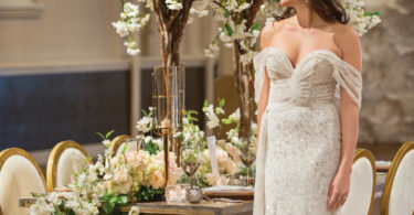 bride in a sequence dress in a boho feel table