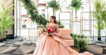 garden vibe with bride in a pink wedding dress