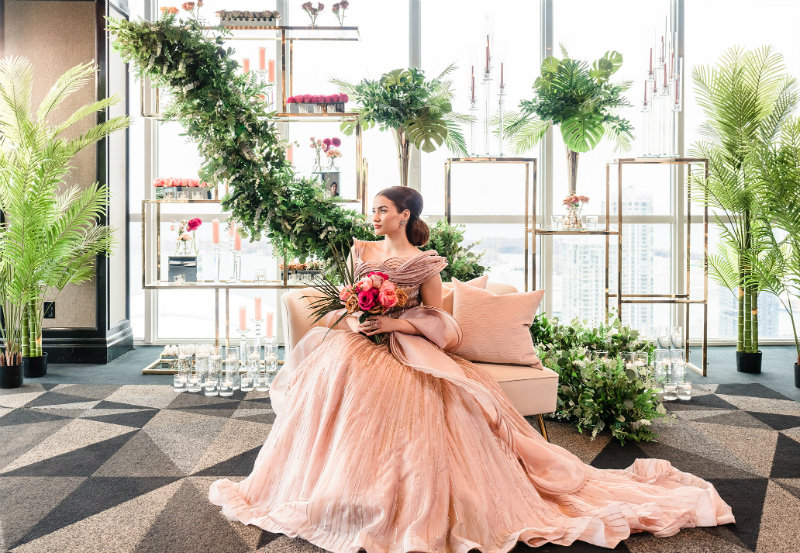 garden vibe with bride in a pink wedding dress