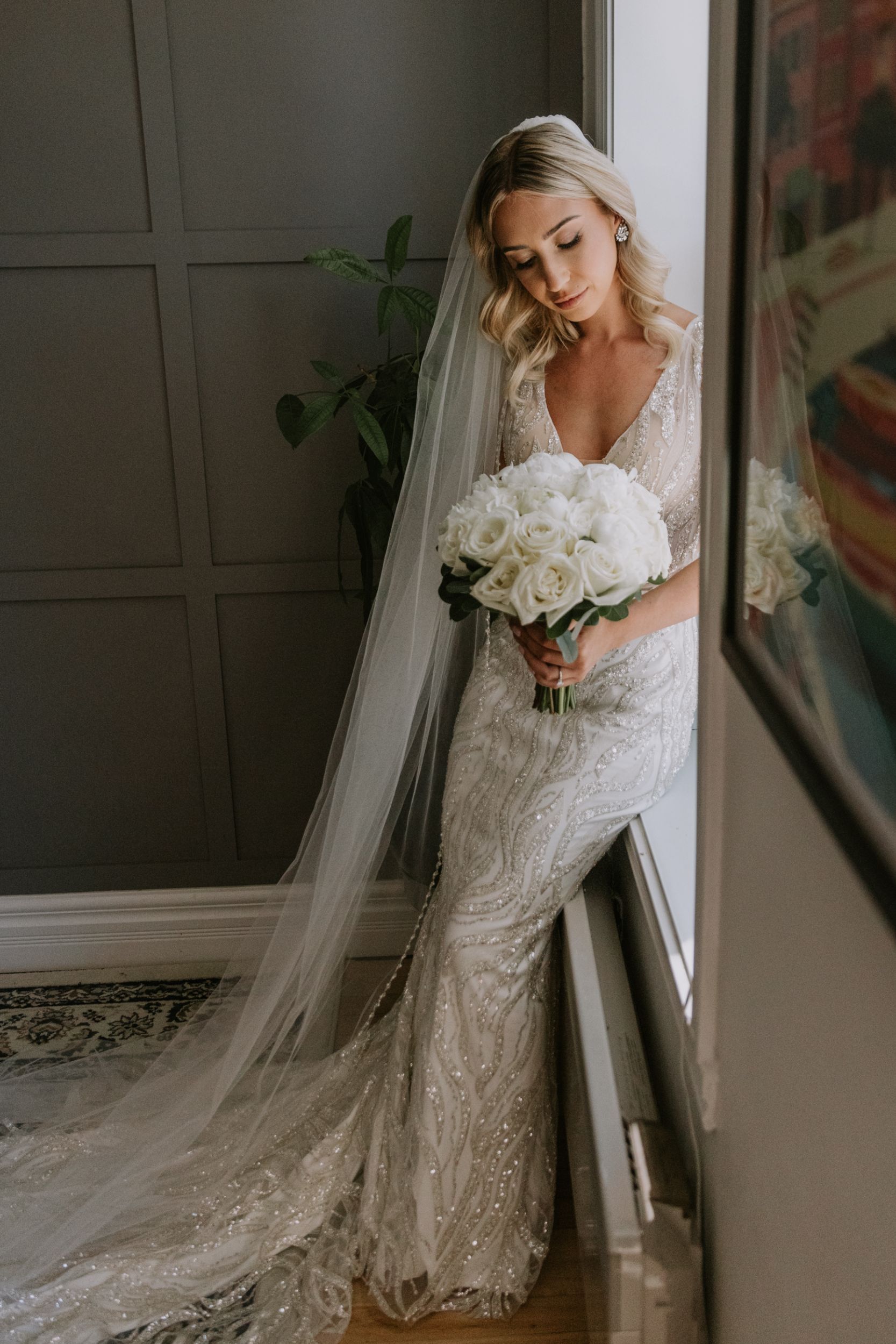 bride with white bouquet