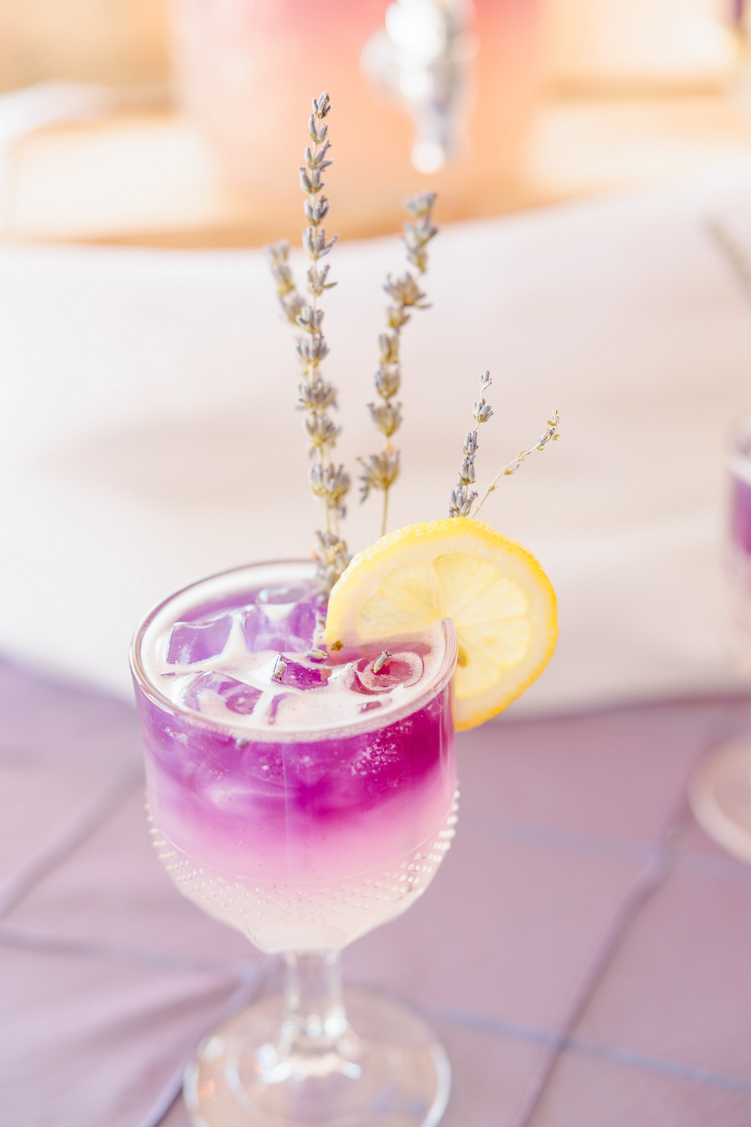 purple signature drink at a wedding