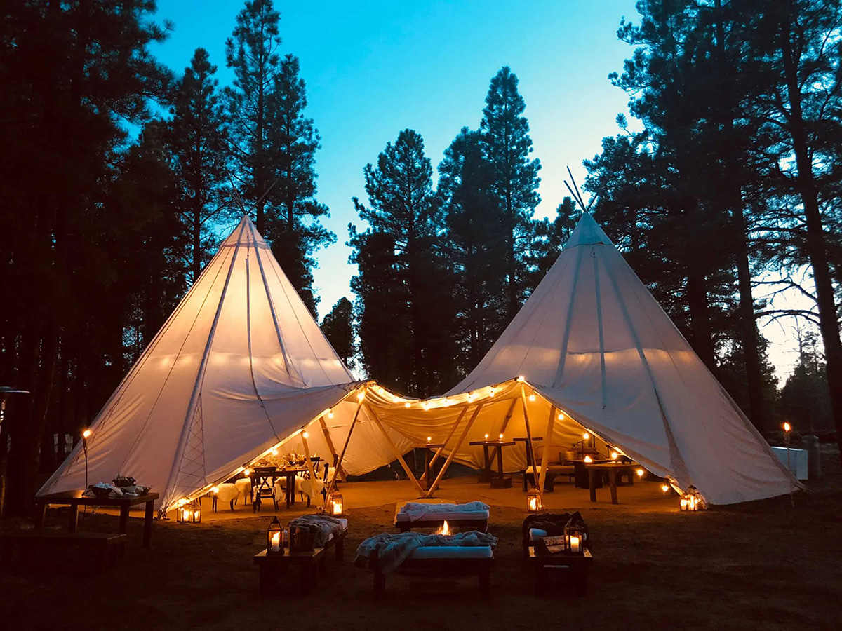 tent wedding in the woods