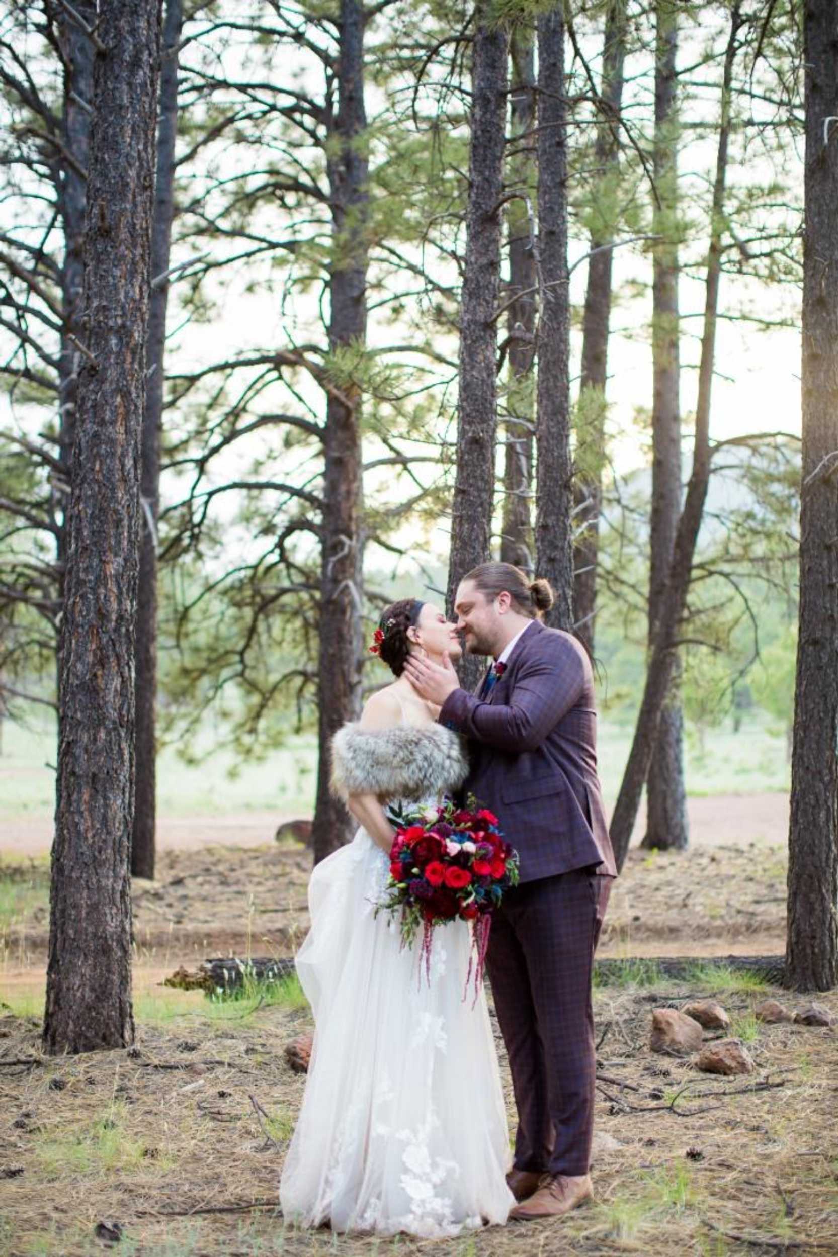 couple planning a wedding in the forest