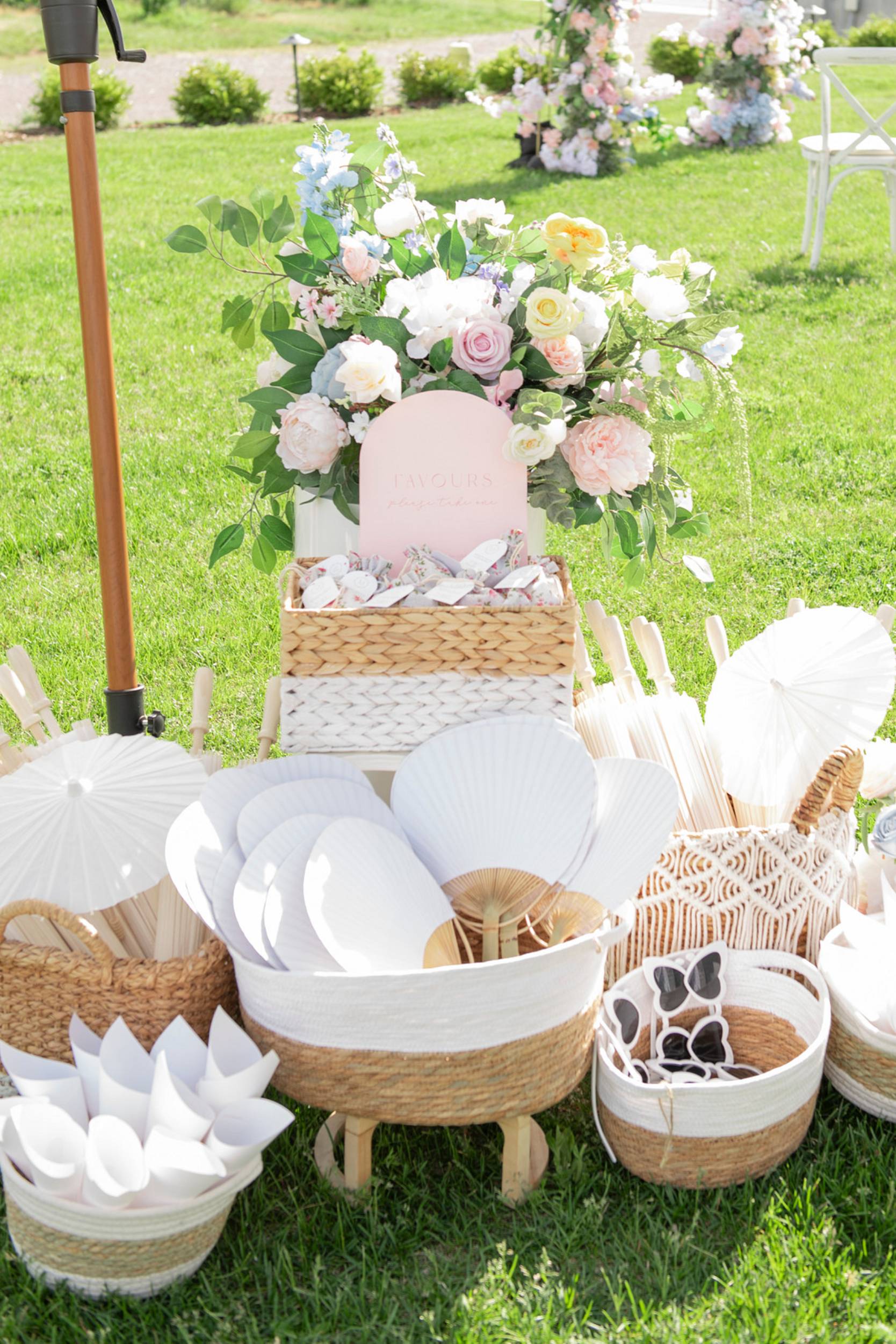 wedding ceremony fans and sunglasses